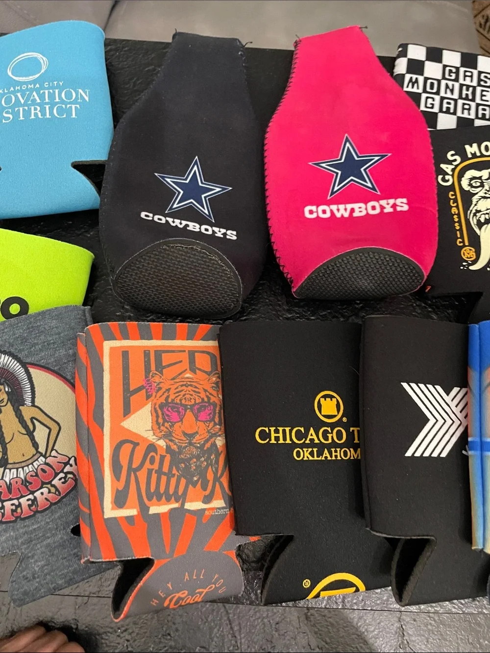 Lot- 21 assorted drink coozies Black/Pink Cowboys Thunder Eskimo Joes Gas Monkey